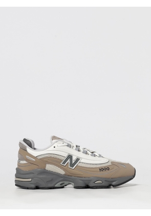 NEW BALANCE Sneakers Men color Black