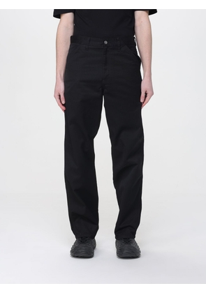CARHARTT WIP Pants Men color Black