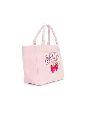 Ganni Medium Trapeze Shopper Bag Raspberry in White.