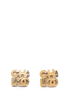 CHANEL Pre-Owned 2000 Silver Plated and Enamel Logo Letters Push Back Earrings costume earrings - Gold