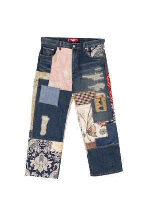 Junya Watanabe MAN patchwork distressed jeans - Blue