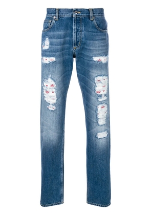 Alexander McQueen distressed folk embroidery jeans - Blue