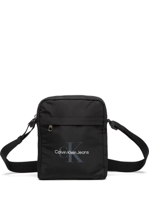 Calvin Klein logo-print messenger bag - Black
