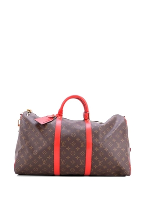Louis Vuitton Pre-Owned Keepall Bandouliere Bag Monogram Canvas with Coquelicot Leather Trim 50 travel bag - Red