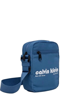 Calvin Klein logo-print messenger bag - Blue