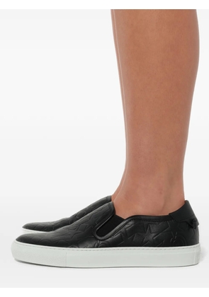 Givenchy logo embossed low skate sneakers - Black