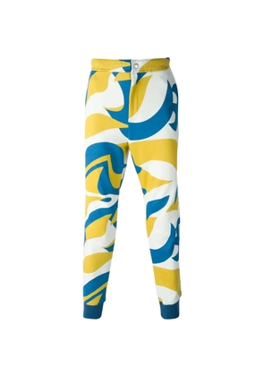 Alexander McQueen abstract-print track pants - Yellow