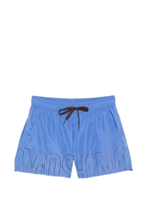 Moschino logo-print drawstring swim shorts - Blue