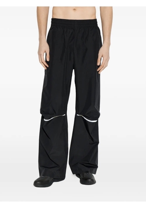 New Balance logo-print piping trousers - Black