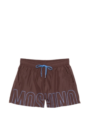 Moschino logo-print drawstring swim shorts - Brown