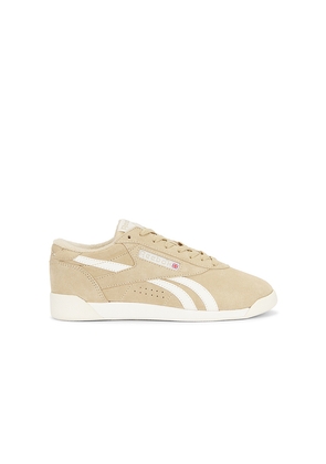 Reebok Freestyle Low Sneaker in Brown. Size 7. Also in 6, 6.5, 7.5, 8, 8.5, 9, 9.5, 10.