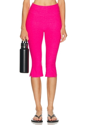 Beyond Yoga Spacedye Midi Rise Slit Capri Legging in Pink Glow Heather - Pink. Size S (also in XS, L).