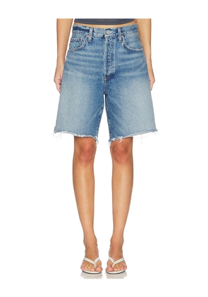 AGOLDE Indra Short Hip Slung Baggy in Blue. Size 23. Also in 24, 25, 26, 27, 28, 29, 30, 32, 33, 34.