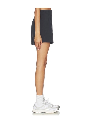Beyond Yoga Stretch Woven Short in Black. Size L. Also in XS, S, XL.