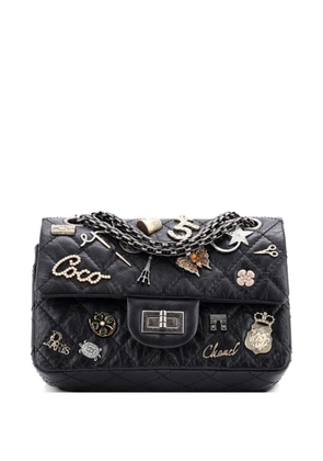 CHANEL Pre-Owned Lucky Charms Reissue 2.55 Flap Bag Quilted Aged Calfskin 224 shoulder bag - Black
