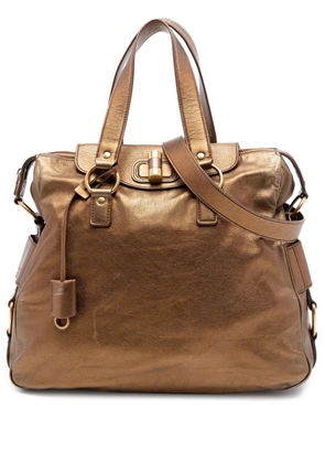 Saint Laurent Pre-Owned 2000-2012 Metallic Calfskin Muse satchel - Brown