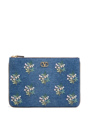 Valentino Garavani VLogo Signature clutch bag in denim with floral-embroidery - Blue