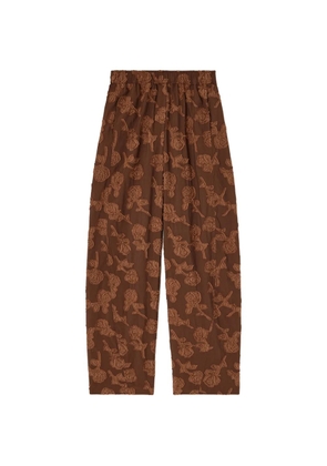 GANNI fil-coupé floral-pattern trousers - Brown