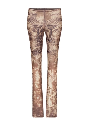 Jean Paul Gaultier medallion-print trousers - Neutrals