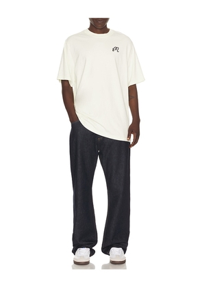Malbon Bermuda Cigar Tee in Cream. Size S. Also in M.