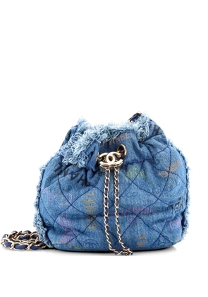 CHANEL Pre-Owned Denim Mood Chain Logo Printed Quilted Fringe Denim Medium bucket bag - Blue