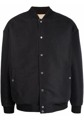 PUMA logo-patch detail bomber jacket - Black
