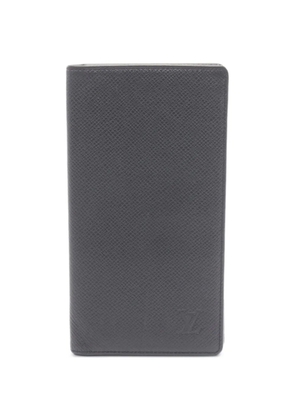 Louis Vuitton Pre-Owned 2003 Taiga bi-fold wallet - Black