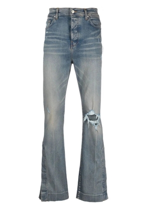 AMIRI ripped-detail bootcut jeans - Blue
