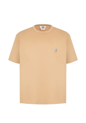 Junya Watanabe MAN x Carhartt logo-print cotton T-shirt - Neutrals