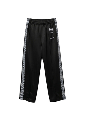 Toga x Umbro logo-embroidered track pants - Black