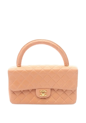 CHANEL Pre-Owned 1996-1997 Parent-child matelassé tote bag - Orange