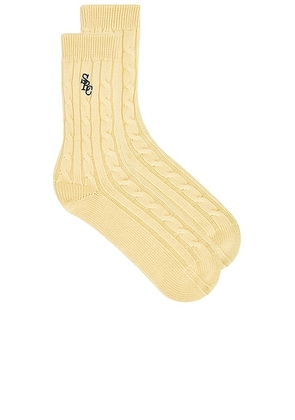 Sporty & Rich SRC Cableknit Socks in Almond - Yellow. Size all.