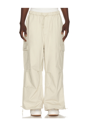 DRMERS CLUB Smiley Logo Parachute Pants in Cream. Size S. Also in M, L, XL/1X.