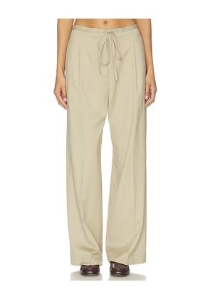 Rohe Relaxed Drawstring Trousers in Beige. Size 34. Also in 36, 38, 40.