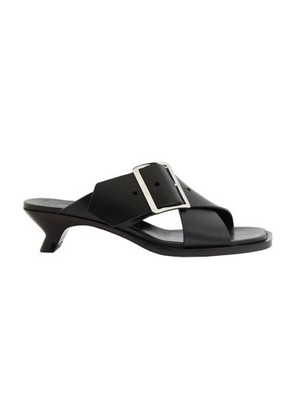 Heeled vegetal leather sandals