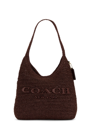 Coach Refined Weave Straw Brooklyn 28 in Brown.