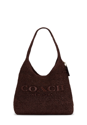 Coach Refined Weave Straw Brooklyn 34 in Brown.