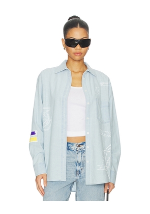 DANNIJOPRO The Doodle Sports Oxford Top in Baby Blue. Size XS. Also in S, M, L.