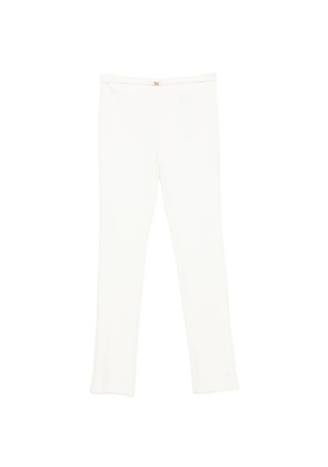 Blumarine logo-plaque flared trousers - White