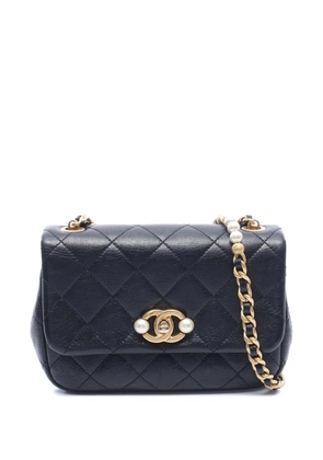 CHANEL Pre-Owned 2021-2026 Mini Glazed Calfskin Pearl Side Flap crossbody bag - Black