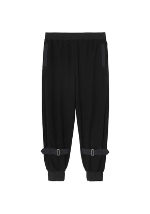 Undercover buckle-detail track pants - Black