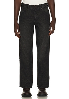 Dickies Relaxed Straight Work Jean in Black Wash Faded - Black. Size 28x32 (also in 30x32, 32x32, 34x32, 36x32, 38x32).
