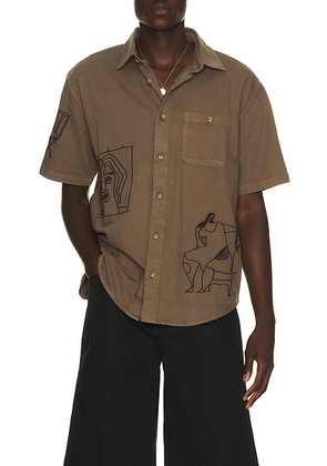 By Parra Crooked Face Short Sleeve Shirt in Brown - Brown. Size XL/1X (also in S, M, L, XXL/2X).