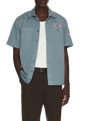 By Parra Gas Station Short Sleeve Shirt in Blue - Slate. Size XXL/2X (also in S, M, L, XL/1X).