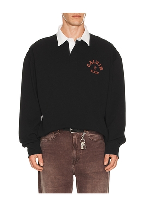Calvin Klein Compact Rugby Long Sleeve Polo in Black. Size M. Also in S, XL/1X.