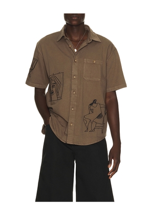 By Parra Crooked Face Short Sleeve Shirt in Brown. Size S. Also in M, L, XL/1X, XXL/2X.