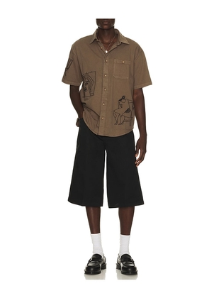 By Parra Crooked Face Short Sleeve Shirt in Brown. Size S. Also in M, L, XL/1X, XXL/2X.