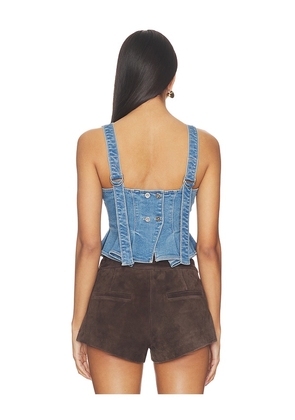 Free People Sunfaded Denim Top in Blue. Size XS. Also in S, M, L, XL.