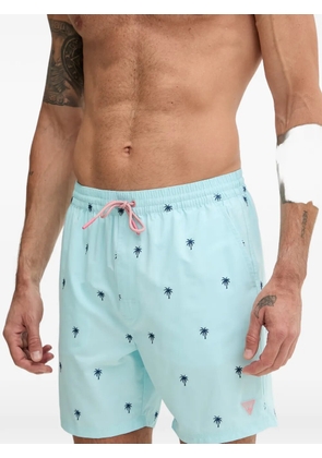 GUESS USA palm-tree swim shorts - Blue