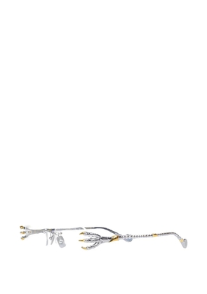 ANNA-KARIN KARLSSON Claw geometric-frame glasses - Silver
